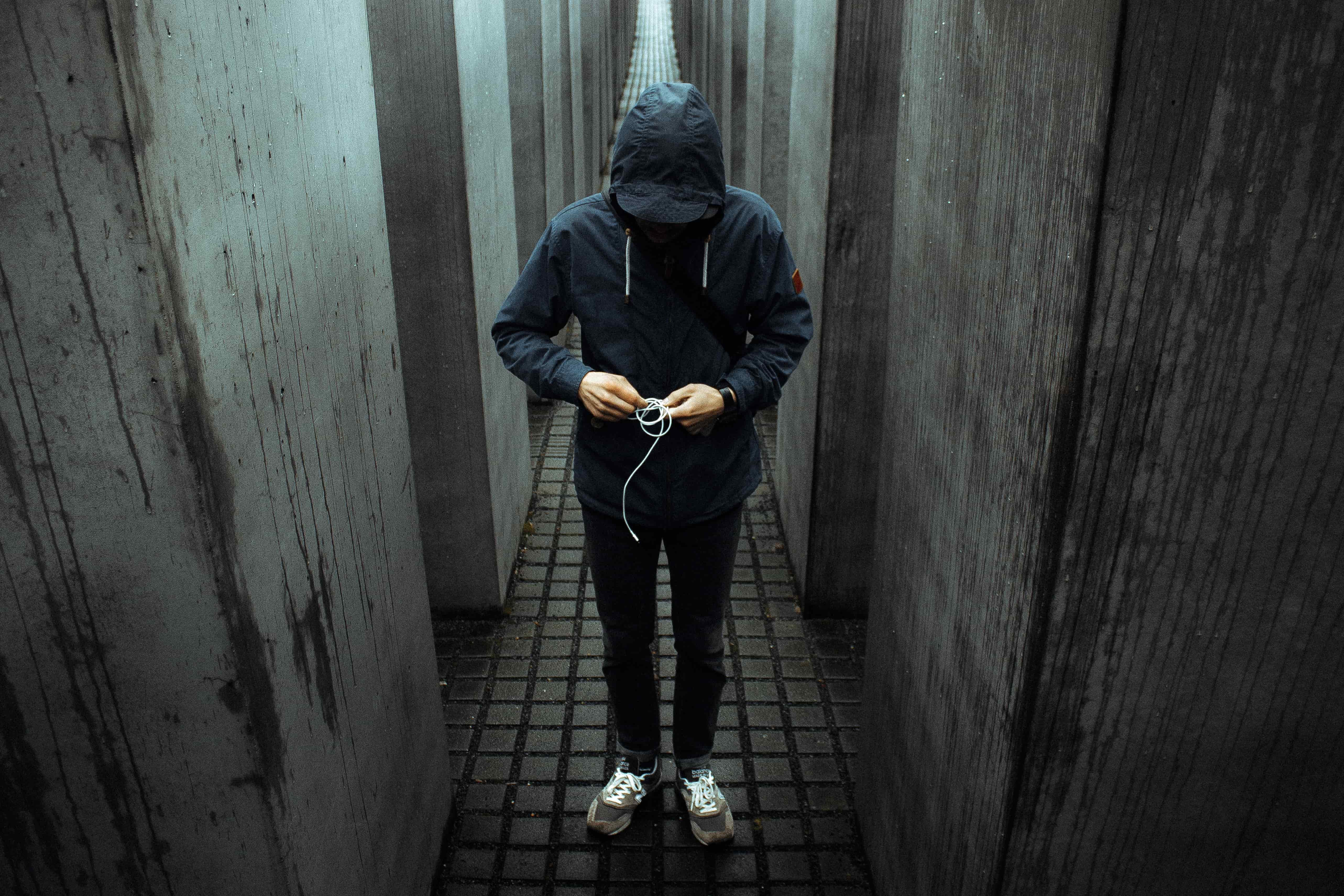 Man standing in concrete maze in dreams