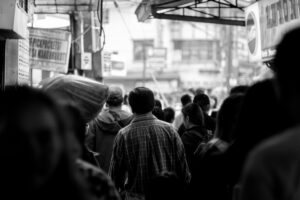 Feeling invisible and insignificant in a crowd of people"